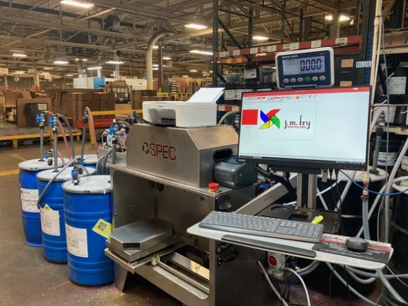 SPEC ECO compact ink dispensing system in a production environment